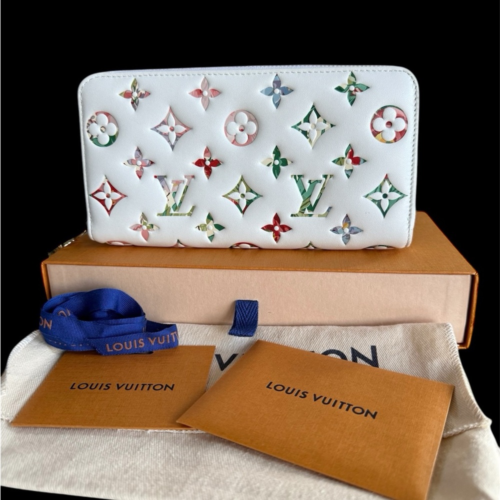 “SOLD” Authentic LV Garden Monogram Zippy Wallet